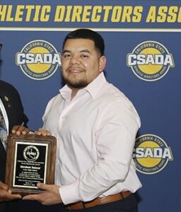 Abraham Salazar serves both as the Athletic Director and Education Specialist responsible for supporting the academic success of students in the 10th and 12th grades at Oakland Unity. An alumnus of Oakland Unity (2011), Salazar completed his undergrad at UCSB, after which he’s returned to his community and been a dedicated leader fostering both the academic and athletic growth of students. In 2025, Abe was honored with the CCSADA Norm Mackenzie Rookie AD of the Year, a recognition that reflects his commitment to leadership, service, and the development of student-athletes. 

This is Salazar’s third year serving as a member of the ADLT.  